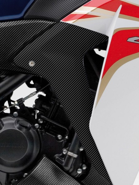 Original Honda CBR125R side panel set, carbon look